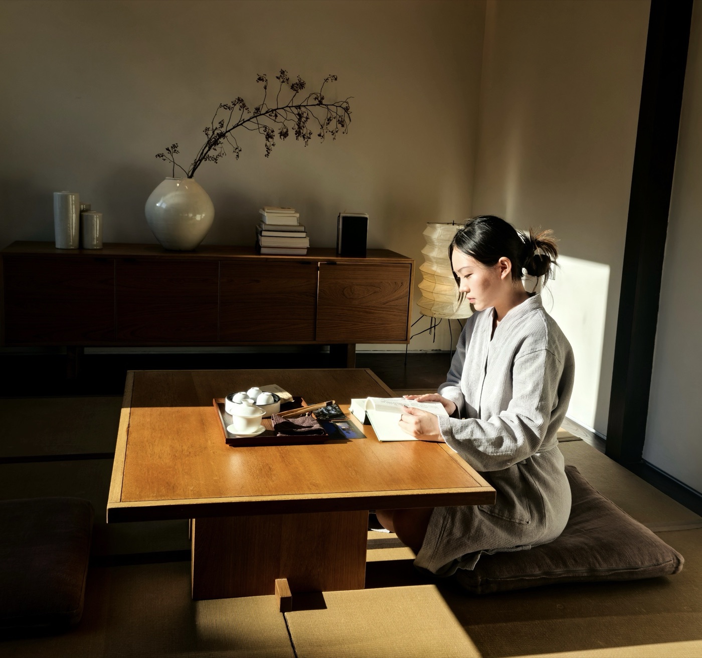 Sitting at a low table in a tatami room
